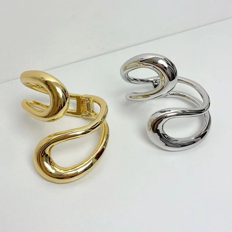 Niche Geometry Spring Bracelet