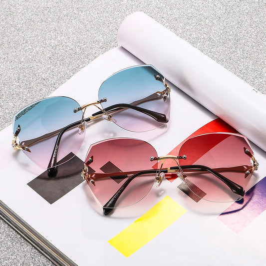 Frameless trimmed sunglasses